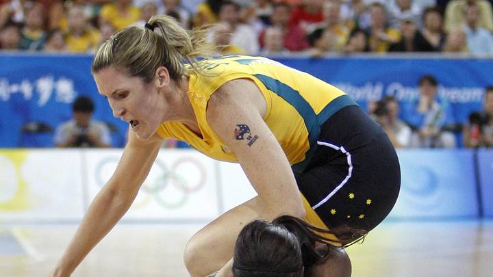 Aug 23, 2008; Beijing, CHINA; USA center Lisa Leslie (bottom) dives for a loose ball against Australia forward Belinda Snell (top) during the womens basketball gold medal basketball game at the Beijing Olympic Basketball Gymnasium during the 2008 Beijing Olympic Games. Mandatory Credit: Jerry Lai-Imagn Images Aug 23, 2008; Beijing, CHINA; USA center Lisa Leslie (bottom) dives for a loose ball against Australia forward Belinda Snell (top) during the womens basketball gold medal basketball game at the Beijing Olympic Basketball Gymnasium during the 2008 Beijing Olympic Games. Mandatory Credit: Jerry Lai-Imagn Images