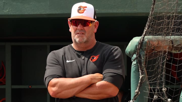 Mar 16, 2024; Sarasota, Florida, USA; Baltimore Orioles manager Brandon Hyde (18)  looks on against