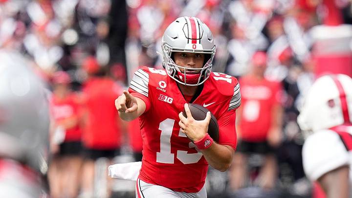 Ohio State Buckeyes quarterback Luke Fahey (13) runs the ball in the second half of the NCAA football game at Ohio Stadium on Sept. 5, 2026 in Columbus, Ohio.