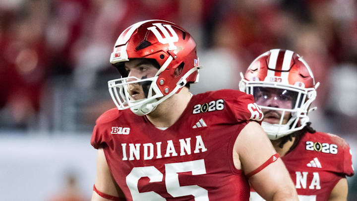 Jan 19, 2026; Miami Gardens, FL, USA; Indiana Hoosiers offensive lineman Carter Smith (65) against the Miami Hurricanes in the College Football Playoff National Championship game at Hard Rock Stadium. Mandatory Credit: Mark J. Rebilas-Imagn Images