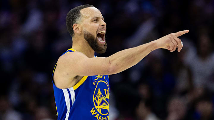 Mar 1, 2025; Philadelphia, Pennsylvania, USA; Golden State Warriors guard Stephen Curry (30) reacts after his dunk against the Philadelphia 76ers during the fourth quarter at Wells Fargo Center. Mandatory Credit: Bill Streicher-Imagn Images