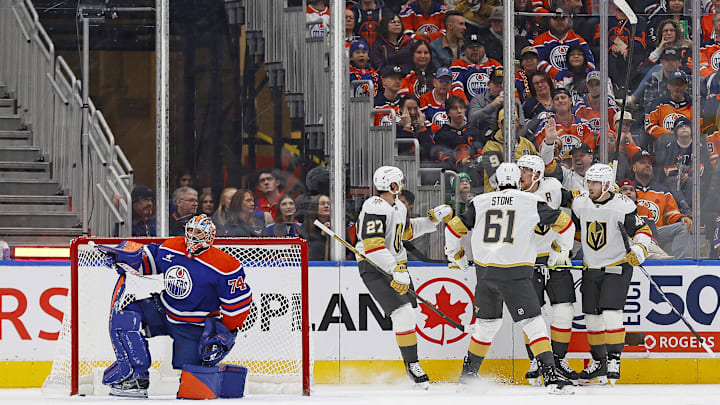 The Vegas Golden Knights celebrate a goal by forward Jack Eichel (9) during the first period against the Edmonton Oilers