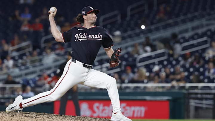 Sep 11, 2024; Washington, District of Columbia, USA; Washington Nationals relief pitcher Kyle Finnegan (67) pitches against the Atlanta Braves during the ninth inning at Nationals Park. 