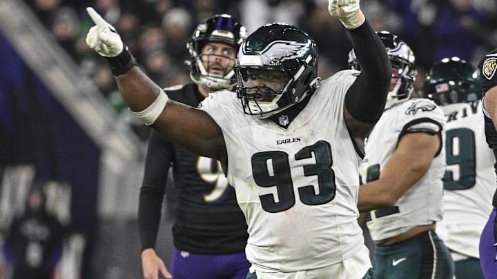 Philadelphia Eagles defensive tackle Milton Williams (93) celebrates as Baltimore Ravens place kicker Justin Tucker (9) reacts to missing a second-half field goal at M&T Bank Stadium this season.