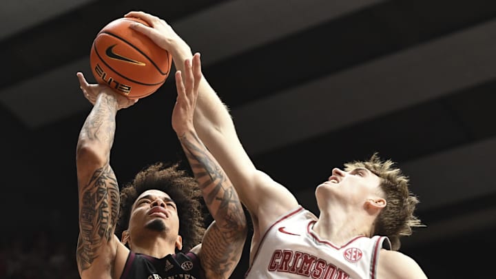 Feb 17, 2024; Tuscaloosa, Alabama, USA; Alabama Crimson Tide forward Grant Nelson (2) blocks a shot