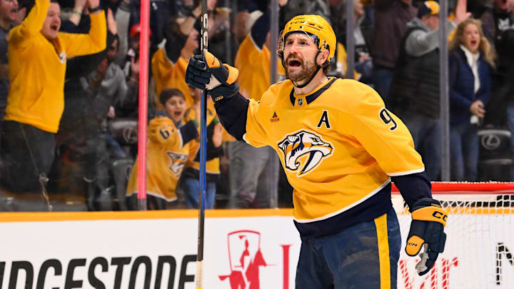 Feb 2, 2026; Nashville, Tennessee, USA;  Nashville Predators left wing Filip Forsberg (9) celebrates his goal against the St. Louis Blues during the second period at Bridgestone Arena. Mandatory Credit: Steve Roberts-Imagn Images