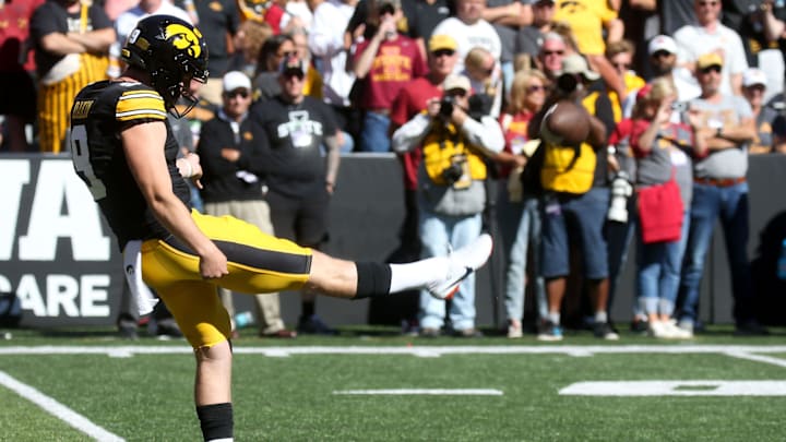 Iowa’s Rhys Dakin (9) punts against Iowa State during the CyHawk game Saturday, Sept. 7, 2024 at Kinnick Stadium in Iowa City, Iowa.