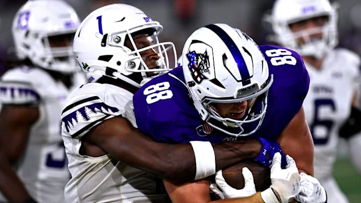 SFA cornerback Charles Demmings and ACU tight end Jed Castles.