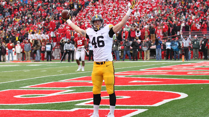 Nov 27, 2015; Lincoln, NE, USA; Iowa Hawkeyes tight end George Kittle (46) celebrates a touchdown in the first quarter against the Nebraska Cornhuskers at Memorial Stadium. Mandatory Credit: Reese Strickland-Imagn Images