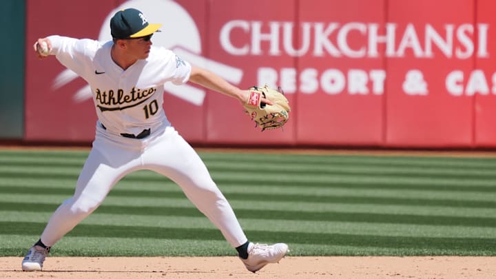 May 1, 2024; Oakland, California, USA; Oakland Athletics third baseman Nick Allen (10) throws the ball to first base for an out against the Pittsburgh Pirates during the ninth inning at Oakland-Alameda County Coliseum. Mandatory Credit: Kelley L Cox-Imagn Images