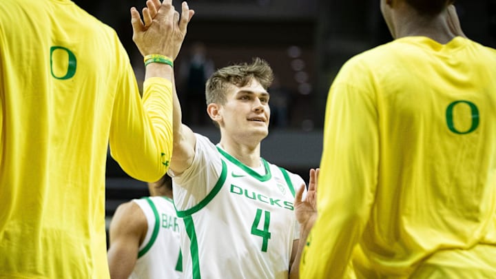 Oregon guard Brennan Rigsby celebrates a shot with teammates.