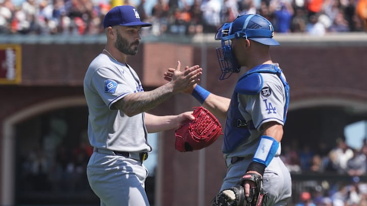 Jul 12, 2025; San Francisco, California, USA; Los Angeles Dodgers pitcher Tanner Scott (left) and catcher Dalton Rushing (right) celebrate after defeating the San Francisco Giants at Oracle Park. Mandatory Credit: Darren Yamashita-Imagn Images