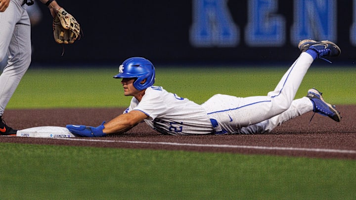 Jun 8, 2024; Lexington, KY, USA; Kentucky Wildcats outfielder Ryan Waldschmidt (21) steals third base during the seventh inning against the Oregon State Beavers at Kentucky Proud Park. Mandatory Credit: Jordan Prather-Imagn Images Jun 8, 2024; Lexington, KY, USA; Kentucky Wildcats outfielder Ryan Waldschmidt (21) steals third base during the seventh inning against the Oregon State Beavers at Kentucky Proud Park. Mandatory Credit: Jordan Prather-Imagn Images