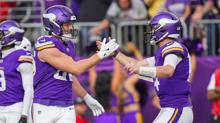 Minnesota Vikings tight end Johnny Mundt and quarterback Sam Darnold