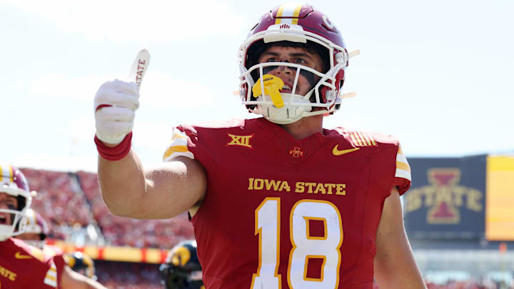 Sep 6, 2025; Ames, Iowa, USA; Iowa State Cyclones tight end Benjamin Brahmer (18) reacts after scoring a touchdown against the Iowa Hawkeyes during the second quarter at Jack Trice Stadium.