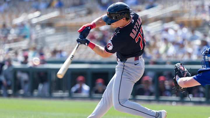 Feb 24, 2026: Cleveland Guardians second baseman Travis Bazzana hits a three run home run against the Los Angeles Dodgers during a spring training game at Camelback Ranch-Glendale. Feb 24, 2026: Cleveland Guardians second baseman Travis Bazzana hits a three run home run against the Los Angeles Dodgers during a spring training game at Camelback Ranch-Glendale.
