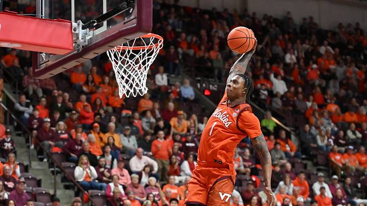 Feb 21, 2026; Blacksburg, Virginia, USA;  Virginia Tech Hokies forward Tobi Lawal (1) goes up for a dunk against the Wake Forest Demon Deacons during the second half at Cassell Coliseum. Mandatory Credit: Brian Bishop-Imagn Images