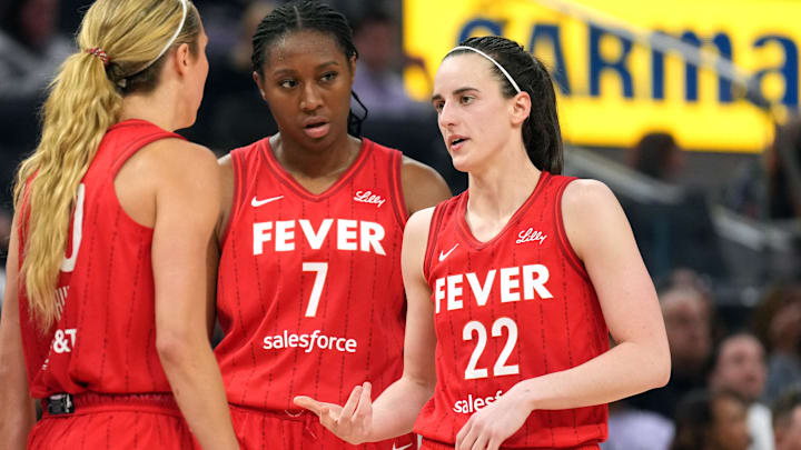 Jun 19, 2025; San Francisco, California, USA; Indiana Fever guard Caitlin Clark (22) talks to guard Lexie Hull (left) and forward Aliyah Boston (7) during the third quarter against the Golden State Valkyries at Chase Center. Mandatory Credit: Darren Yamashita-Imagn Images Jun 19, 2025; San Francisco, California, USA; Indiana Fever guard Caitlin Clark (22) talks to guard Lexie Hull (left) and forward Aliyah Boston (7) during the third quarter against the Golden State Valkyries at Chase Center. Mandatory Credit: Darren Yamashita-Imagn Images