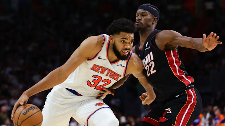 Oct 30, 2024; Miami, Florida, USA; New York Knicks center Karl-Anthony Towns (32) drives to the basketball against Miami Heat forward Jimmy Butler (22) during the fourth quarter at Kaseya Center. Mandatory Credit: Sam Navarro-Imagn Images Oct 30, 2024; Miami, Florida, USA; New York Knicks center Karl-Anthony Towns (32) drives to the basketball against Miami Heat forward Jimmy Butler (22) during the fourth quarter at Kaseya Center. Mandatory Credit: Sam Navarro-Imagn Images