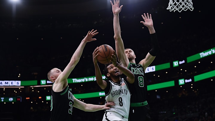 Mar 18, 2025; Boston, Massachusetts, USA; Brooklyn Nets forward Ziaire Williams (8) drives to the basket while Boston Celtics center Kristaps Porzingis (8) defends during the first half at TD Garden. Mandatory Credit: Bob DeChiara-Imagn Images Mar 18, 2025; Boston, Massachusetts, USA; Brooklyn Nets forward Ziaire Williams (8) drives to the basket while Boston Celtics center Kristaps Porzingis (8) defends during the first half at TD Garden. Mandatory Credit: Bob DeChiara-Imagn Images