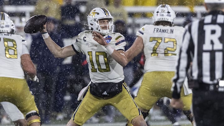 Dec 27, 2024; Birmingham, AL, USA; Georgia Tech Yellow Jackets quarterback Haynes King (10) looks to throw against the Vanderbilt Commodores during the second half of the 2024 Birmingham Bowl at Protective Stadium. Mandatory Credit: Vasha Hunt-Imagn Images