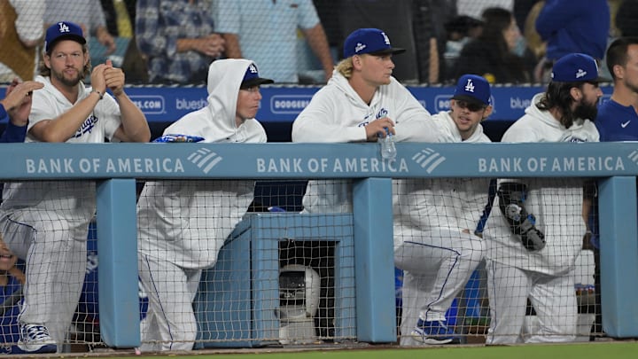 Sep 18, 2023; Los Angeles, California, USA; Los Angeles Dodgers starting pitcher Clayton Kershaw (22), starting pitcher Ryan Pepiot (47), starting pitcher Emmet Sheehan (80), starting pitcher Gavin Stone (71) and starting pitcher Tony Gonsolin (26) look on from the dugout during the game against the Detroit Tigers at Dodger Stadium. Mandatory Credit: Jayne Kamin-Oncea-Imagn Images Sep 18, 2023; Los Angeles, California, USA; Los Angeles Dodgers starting pitcher Clayton Kershaw (22), starting pitcher Ryan Pepiot (47), starting pitcher Emmet Sheehan (80), starting pitcher Gavin Stone (71) and starting pitcher Tony Gonsolin (26) look on from the dugout during the game against the Detroit Tigers at Dodger Stadium. Mandatory Credit: Jayne Kamin-Oncea-Imagn Images