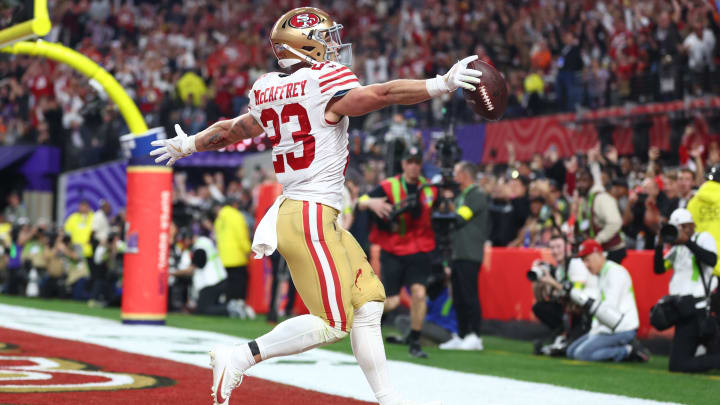 Feb 11, 2024; Paradise, Nevada, USA; San Francisco 49ers running back Christian McCaffrey (23) scores a touchdown in the first half of Super Bowl LVIII at Allegiant Stadium. Mandatory Credit: Mark J. Rebilas-USA TODAY Sports