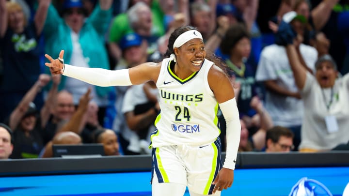 Dallas Wings guard Arike Ogunbowale (24) reacts after scoring during the fourth quarter against the Chicago Sky at College Park Center. Dallas Wings guard Arike Ogunbowale (24) reacts after scoring during the fourth quarter against the Chicago Sky at College Park Center.