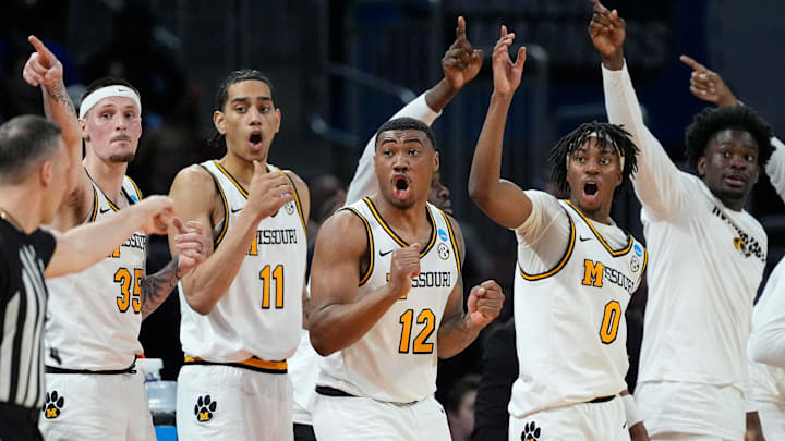 A group of Missouri Tigers players celebrate after a basket, in a game versus the Drake Bulldogs last season.