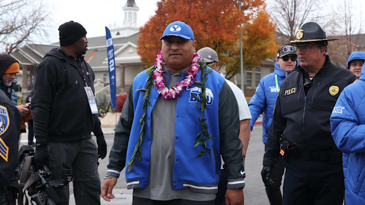 Nov 18, 2023; Provo, Utah, USA; Brigham Young Cougars head coach Kalani Sitake arrives at LaVell Nov 18, 2023; Provo, Utah, USA; Brigham Young Cougars head coach Kalani Sitake arrives at LaVell