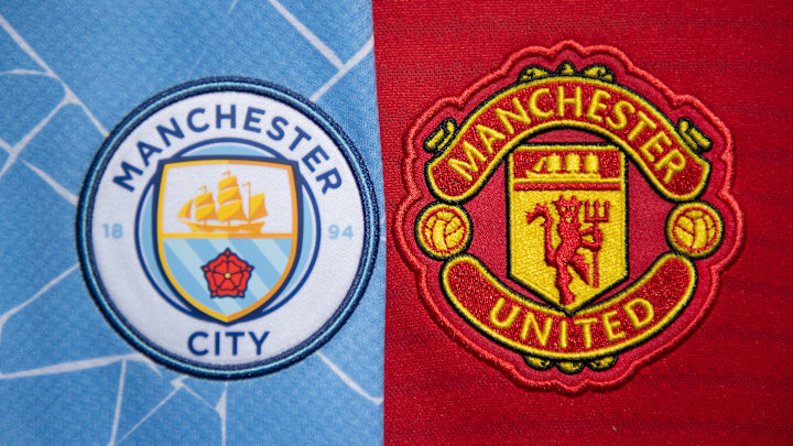 The Manchester City and Manchester United Club Badges