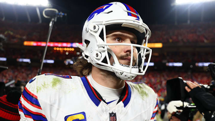 Buffalo Bills quarterback Josh Allen (17) walks off the field after the AFC Championship game against the Kansas City Chiefs at GEHA Field at Arrowhead Stadium.