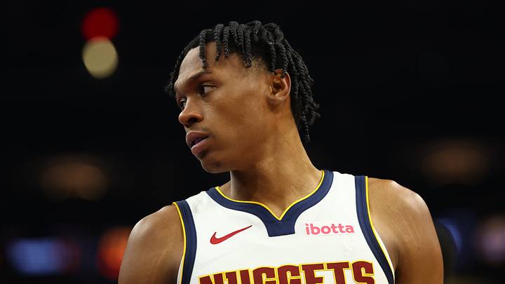 Nov 29, 2025; Phoenix, Arizona, USA; Denver Nuggets guard Peyton Watson (8) against the Phoenix Suns at the Mortgage Matchup Center.