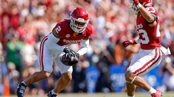 Oct 12, 2024; Dallas, Texas, USA; Oklahoma Sooners defensive back Billy Bowman Jr. (2) intercepts a pass during the first quarter against the Texas Longhorns at the Cotton Bowl. Mandatory Credit: Andrew Dieb-Imagn Images