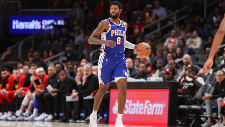 Oct 14, 2024; Atlanta, Georgia, USA; Philadelphia 76ers forward Paul George (8) dribbles against the Atlanta Hawks in the first quarter at State Farm Arena. Mandatory Credit: Brett Davis-Imagn Images