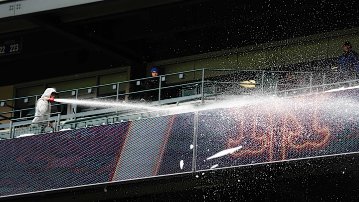General view as a Colorado Rockies stadium crew clears snow before the game against the New York Mets at Coors Field. 
