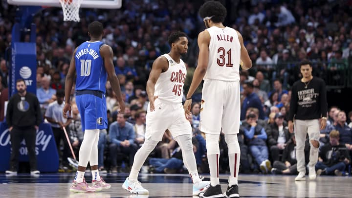 Dec 14, 2022; Dallas, Texas, USA;  Cleveland Cavaliers guard Donovan Mitchell (45) celebrates with Cleveland Cavaliers center Jarrett Allen (31) during the second quarter against the Dallas Mavericks at American Airlines Center. Mandatory Credit: Kevin Jairaj-USA TODAY Sports