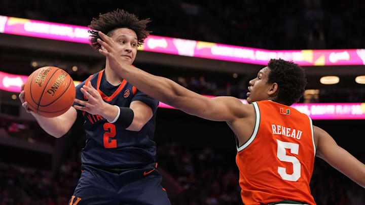 Mar 13, 2026; Charlotte, NC, USA; Virginia Cavaliers guard Chance Mallory (2) looks to pass as Miami (FL) Hurricanes forward Malik Reneau (5) defends in the second half at Spectrum Center. Mandatory Credit: Bob Donnan-Imagn Images Mar 13, 2026; Charlotte, NC, USA; Virginia Cavaliers guard Chance Mallory (2) looks to pass as Miami (FL) Hurricanes forward Malik Reneau (5) defends in the second half at Spectrum Center. Mandatory Credit: Bob Donnan-Imagn Images