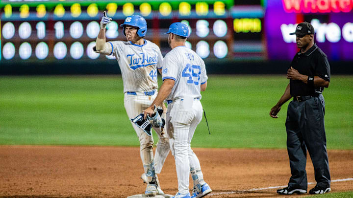 May 24, 2024; Charlotte, NC, USA; North Carolina Tar Heels catcher Luke Stevenson (44) celebrates an RBI in the seventh inning against the Wake Forest during the ACC Baseball Tournament at Truist Field. Mandatory Credit: Scott Kinser-Imagn Images