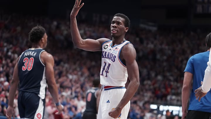 Kansas Jayhawks guard Melvin Council Jr. (14) throws up his hand after a shot against Arizona Wildcats during the game inside Allen Fieldhouse on Feb. 9, 2026.