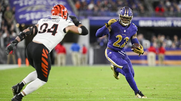 Baltimore Ravens running back Derrick Henry rushes as Cincinnati Bengals defensive end Sam Hubbard defends. Baltimore Ravens running back Derrick Henry rushes as Cincinnati Bengals defensive end Sam Hubbard defends.