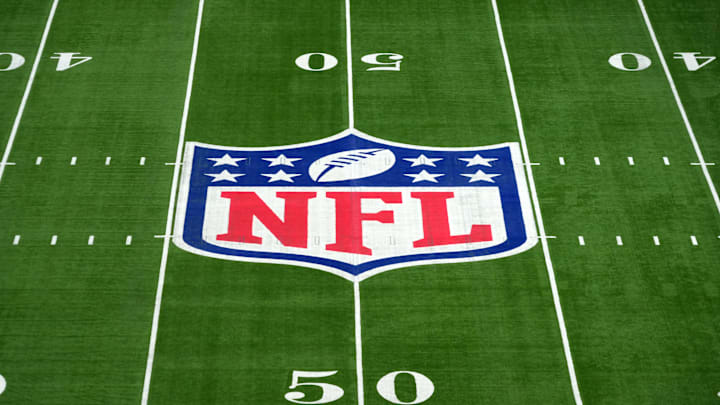 Oct 6, 2024; London, United Kingdom; The NFL shild logo at midfield at Tottenham Hotspur Stadium. Mandatory Credit: Kirby Lee-Imagn Images