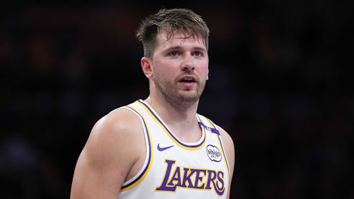 Mar 16, 2025; Los Angeles, California, USA; Los Angeles Lakers guard Luka Doncic (77) reacts against the Phoenix Suns in the second half at Crypto.com Arena. Mandatory Credit: Kirby Lee-Imagn Images