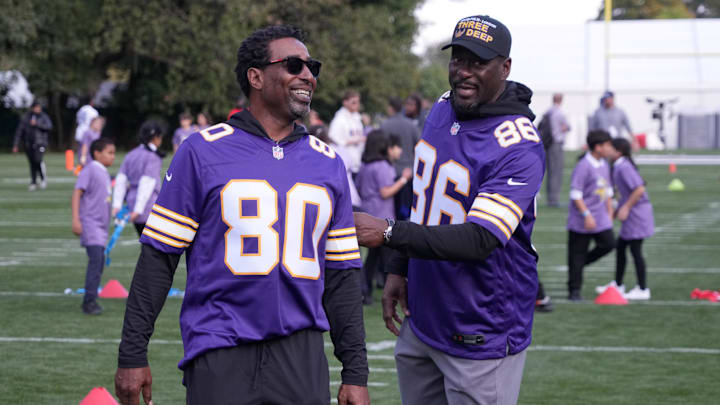 Oct 4, 2024; Watford, United Kingdom; Minnesota Vikings former receivers Cris Carter (80) and Jake Reed (86) at NFL flag football event at The Grove.