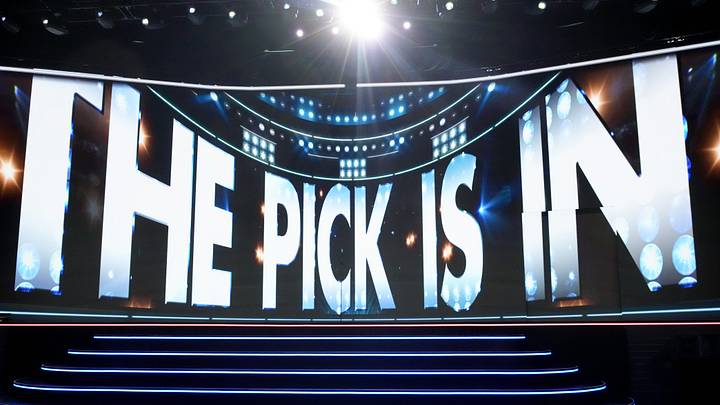 Jun 27, 2025; Los Angeles, California, USA; The video board shows the 20th overall pick for the Columbus Blue Jackets is about to be announced in the first round of the 2025 NHL Draft at Peacock Theater. Mandatory Credit: Kirby Lee-Imagn Images
