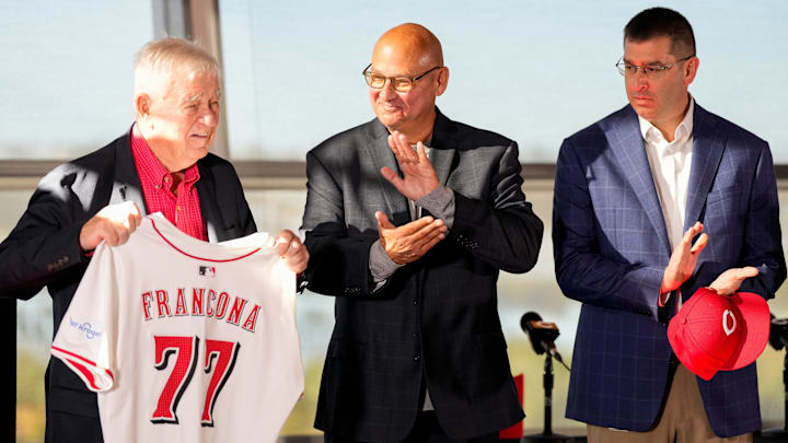 Team owner Bob Castellini shows off a Reds jersey for new manager Terry Francona during an event to introduce the new manager of the Cincinnati Reds at Great American Ball Park in downtown Cincinnati on Monday, Oct. 7, 2024. Team owner Bob Castellini shows off a Reds jersey for new manager Terry Francona during an event to introduce the new manager of the Cincinnati Reds at Great American Ball Park in downtown Cincinnati on Monday, Oct. 7, 2024.