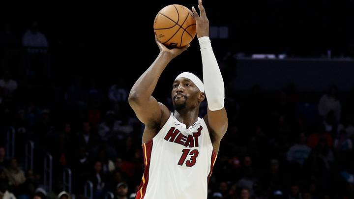 Oct 24, 2026; Charlotte, North Carolina, USA;  Miami Heat center Bam Adebayo (13) attempts a jump shot during the fourth quarter against the Charlotte Hornets at Spectrum Center.  Mandatory Credit: Brian Westerholt-Imagn Images
