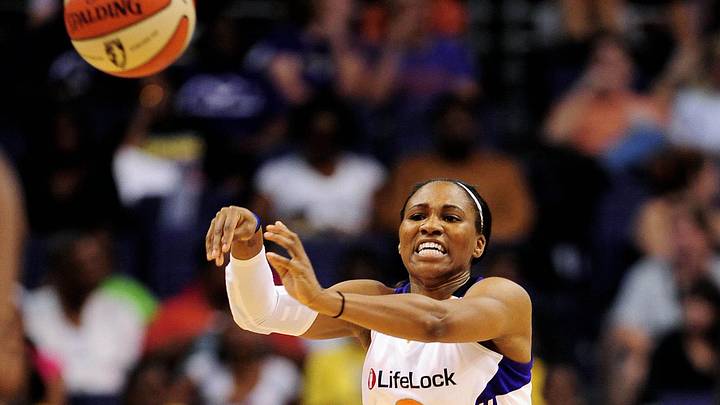 Sep 11, 2011; Phoenix, AZ, USA; Phoenix Mercury guard Temeka Johnson (2) makes a pass while playing against the Minnesota Lynx during the second half at the US Airways Center.  The Lynx defeated the Mercury 96-90. Mandatory Credit: Jennifer Stewart-Imagn Images