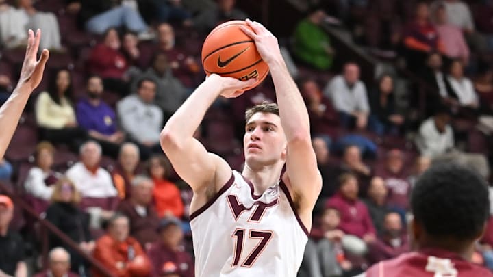 Mar 3, 2026; Blacksburg, Virginia, USA; Virginia Tech Hokies guard Neoklis Avdalas (17) shoots a shot as Boston College Eagles guard Fred Payne (5) defends during the second half at Cassell Coliseum. Mandatory Credit: Brian Bishop-Imagn Images Mar 3, 2026; Blacksburg, Virginia, USA; Virginia Tech Hokies guard Neoklis Avdalas (17) shoots a shot as Boston College Eagles guard Fred Payne (5) defends during the second half at Cassell Coliseum. Mandatory Credit: Brian Bishop-Imagn Images