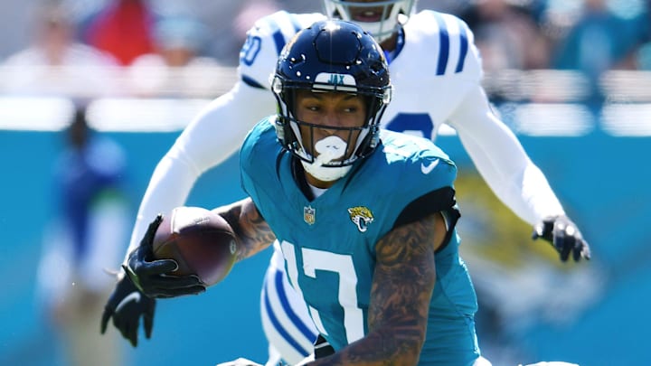 Indianapolis Colts cornerback JuJu Brents (29) pulls down Jacksonville Jaguars tight end Evan Engram